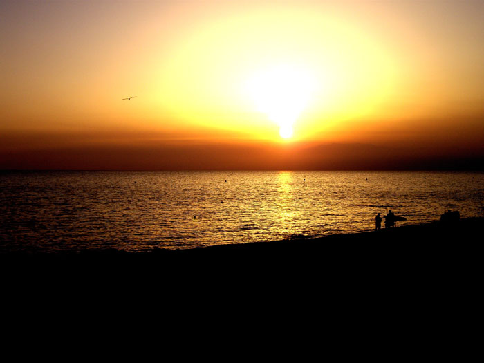 posta de sol des de la platja de Las Salinas
